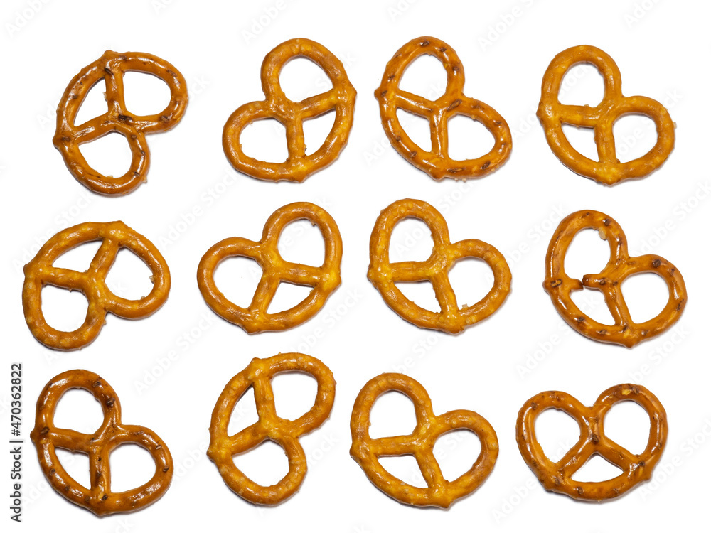 Pretzels with salt on a white background. Flour products. Baking for tea. Pretzels with salt on a white background. Flour products. Baking for tea.