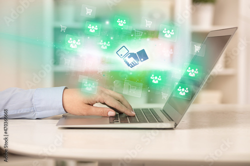 Businessman working on laptop with new business