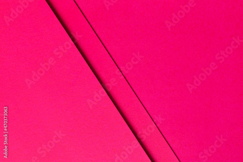 abstract background concept, fuchsia pink paper is stacked on top of a blank fuchsia pink paper with copy space, which can be used as a design element or for website cover ideas.