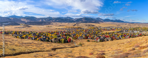 Autumn Foothill Village - A colorful panoramic Autumn day view of a small foothill neighborhood, as seen from North Table Loop Trail. Denver-Golden-Arvada, Colorado, USA.  © Sean Xu