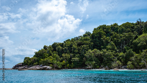 Similan Islands Phuket, tropical white beach with palm trees and blue ocean in Thailand Andaman sea photo