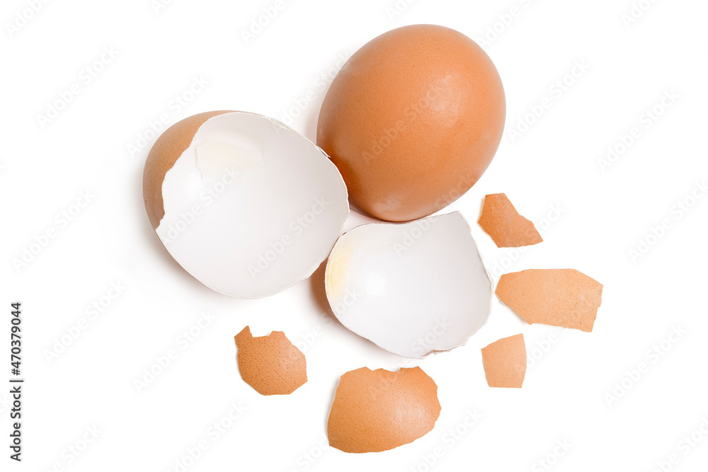 Top view group of broken eggshells stacked on white background. Top view group of broken eggshells stacked on white background.
