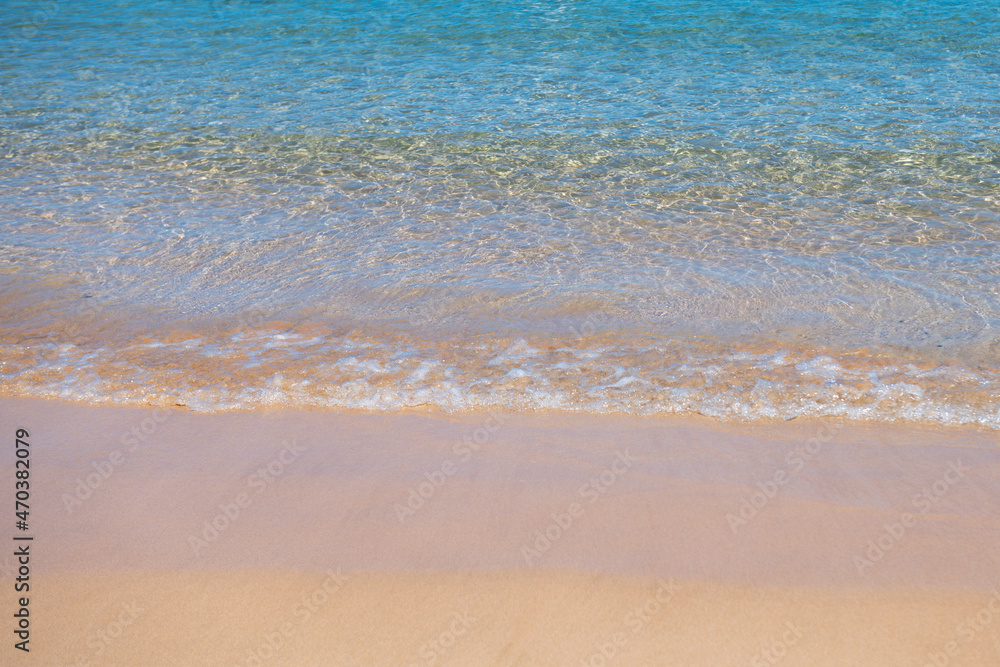 Sea background, nature of tropical summer beach with rays of sun light. Sand beach, sea water with copy space, summer vacation concept. Sea background, nature of tropical summer beach with rays of sun light. Sand beach, sea water with copy space, summer vacation concept.