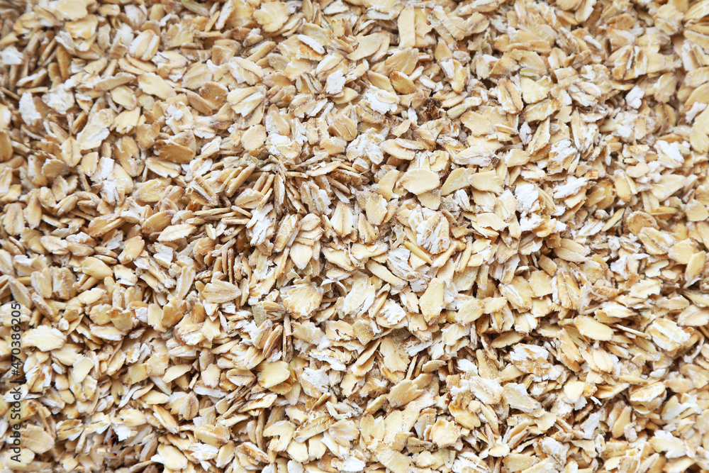 Oatmeal flakes texture background even layer Oatmeal flakes texture background even layer