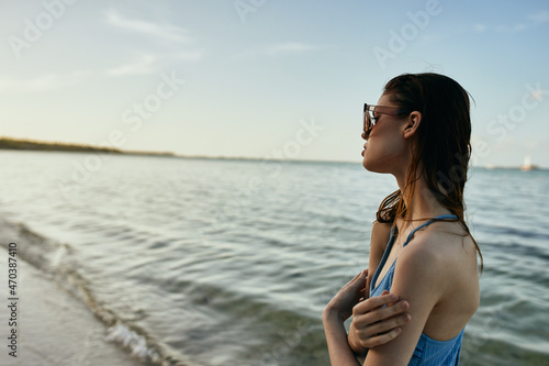 woman in swimsuit jungle exotic tropical green leaves