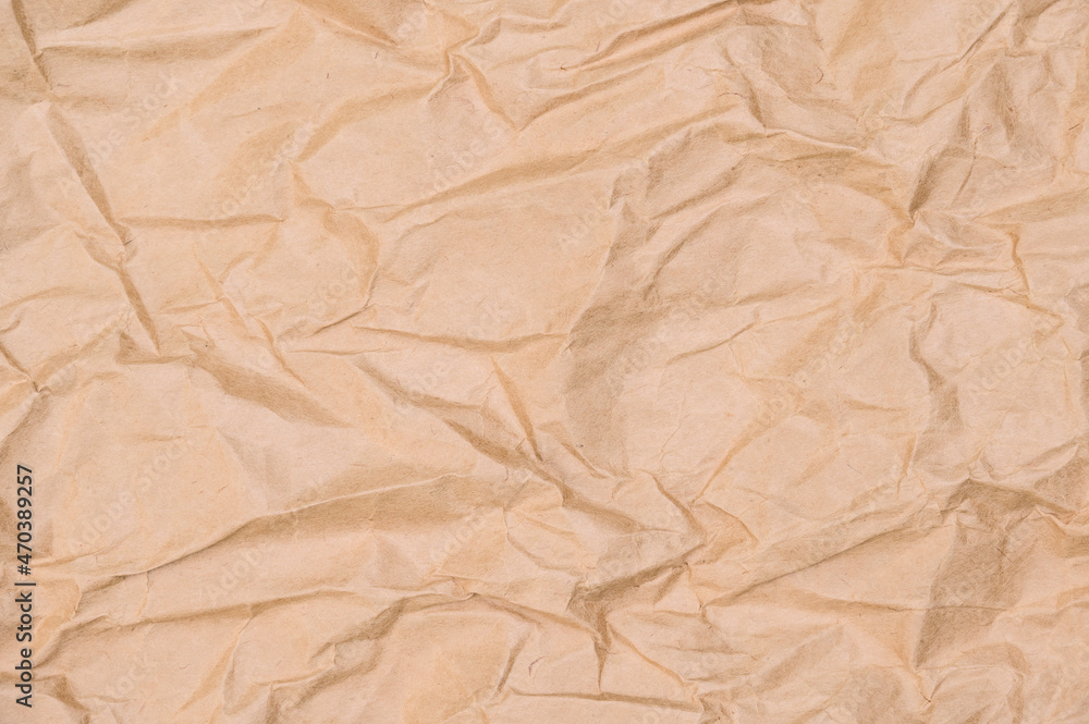 Brown crumpled paper texture background,be crush paper for creased and wrinkled for texture backdrop from shockproof paper Brown crumpled paper texture background,be crush paper for creased and wrinkled for texture backdrop from shockproof paper