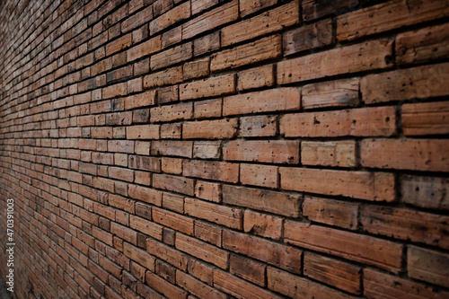 Old red brick wall background, Side-focus shot in the center of the frame