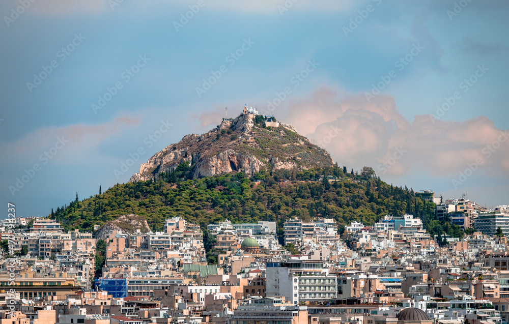 View of Mount Lycabettus and Kolonaki district from the Areopagus Hill. Athens, Greece.