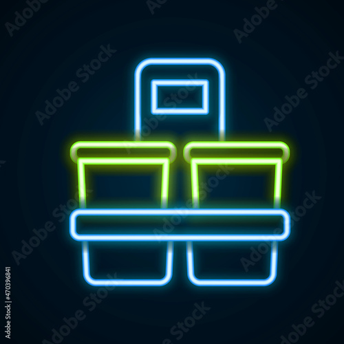 Glowing neon line Coffee cup to go icon isolated on black background. Colorful outline concept. Vector