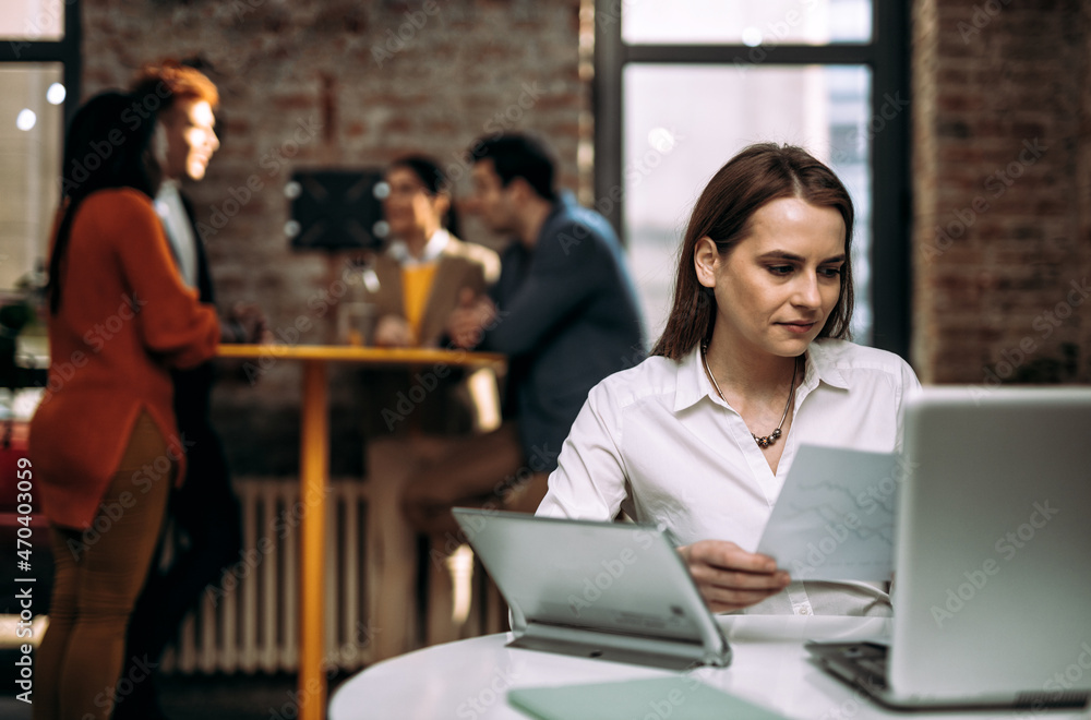 Cinematic image of employers working in a start up business Cinematic image of employers working in a start up business