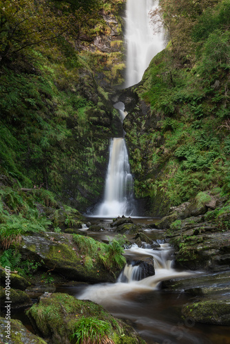 Stunning long exposure landscape early Autumn image of Pistyll Rhaeader waterfall in Wales  the tallest waterfall in UK