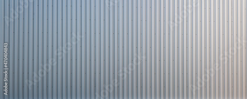 фотографія Texture of a corrugated sheet metal aluminum facade