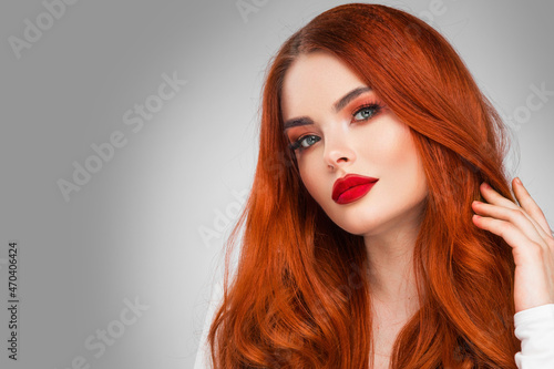 Fototapeta Glamour woman with long red hair