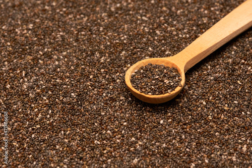 Wallpaper Mural Wooden spoon full of organic natural chia seeds close-up Torontodigital.ca