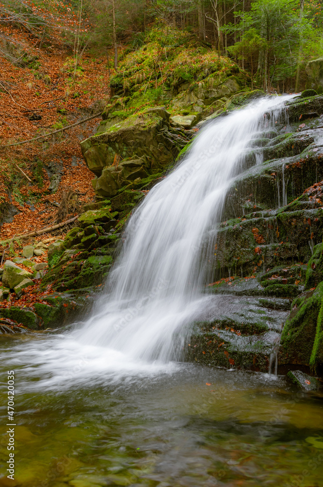 Waterfall in Obidza, late autumn, Beskid Sadecki mountain range in Carpathian Mountains, Poland.