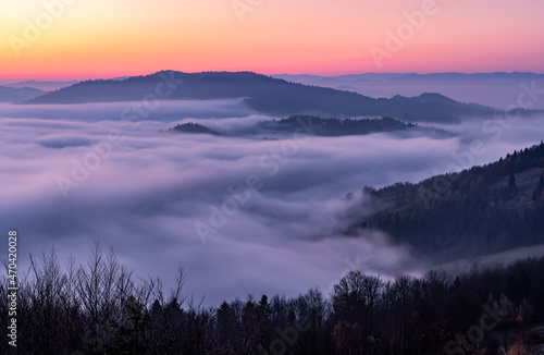 Fototapeta Naklejka Na Ścianę i Meble -  Misty autumn mountains landscape in the morning, Poland, Beskidy mountains seen from Koziarz peak.