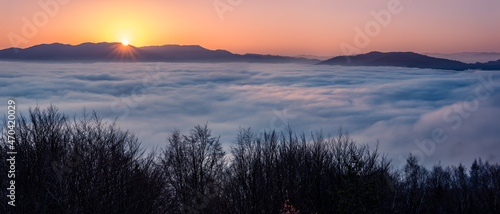 Fototapeta Naklejka Na Ścianę i Meble -  Misty autumn mountains landscape in the morning, Poland, Beskidy mountains, Prehyba peak seen from Koziarz.