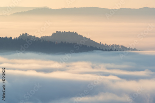 Misty autumn mountains landscape in the morning, Poland, Beskidy mountains