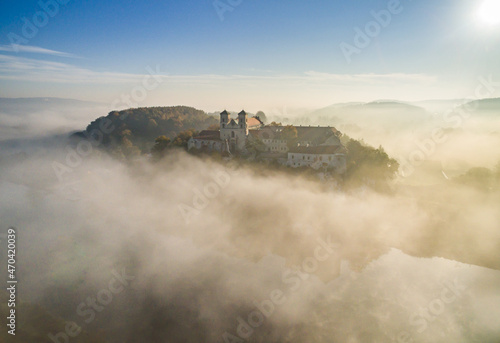 Aerial view of Tyniec abbey in the morning mists  beautiful sunrise  Krakow  Poland