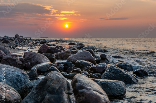 Baltic sea coast, beach and cliffs at Gdynia Orlowo during sunrise, Poland