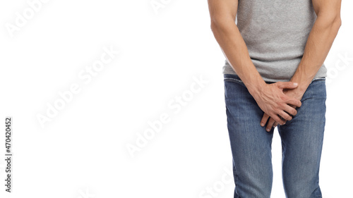 Fotografía Cropped millennial european muscular male suffering from groin pain, presses han