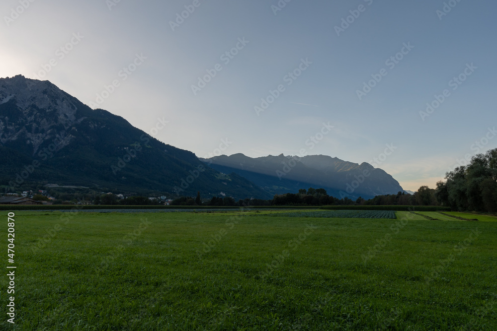 Schaan, Liechtenstein, September 25, 2021 Green field just before sunrise