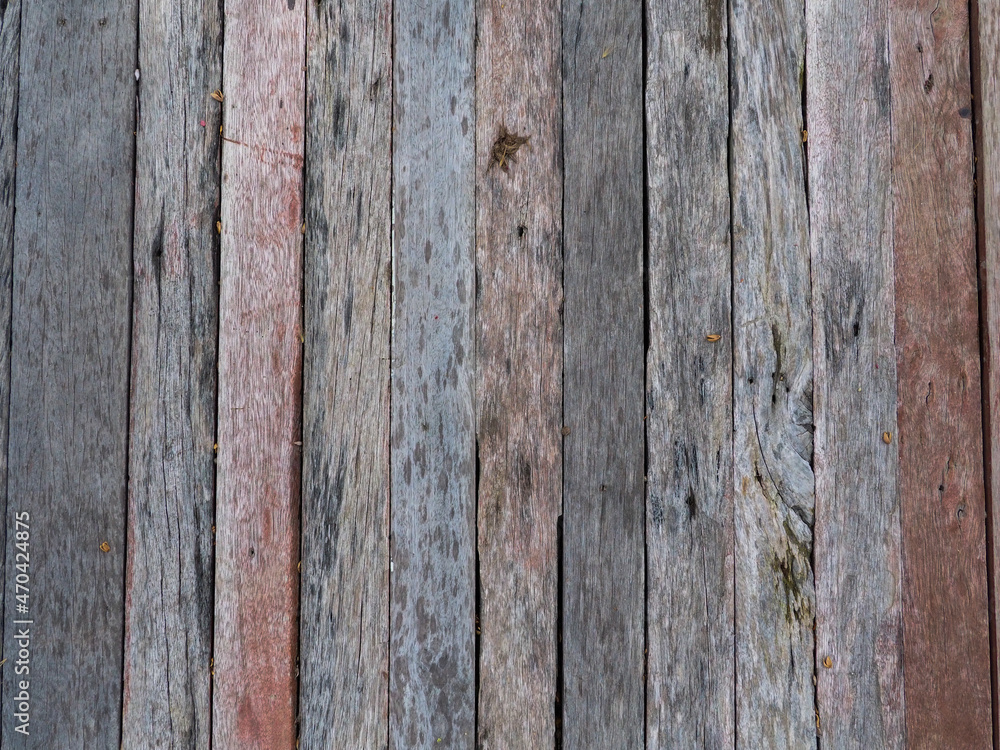 old wooden planks stacked together old wooden planks stacked together