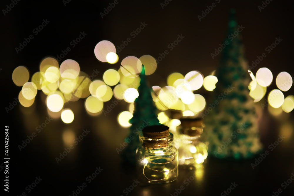 Evergreen tree handmade toys, garland and fir branch on stone background, Xmas greeting card with space for text wish Evergreen tree handmade toys, garland and fir branch on stone background, Xmas greeting card with space for text wish