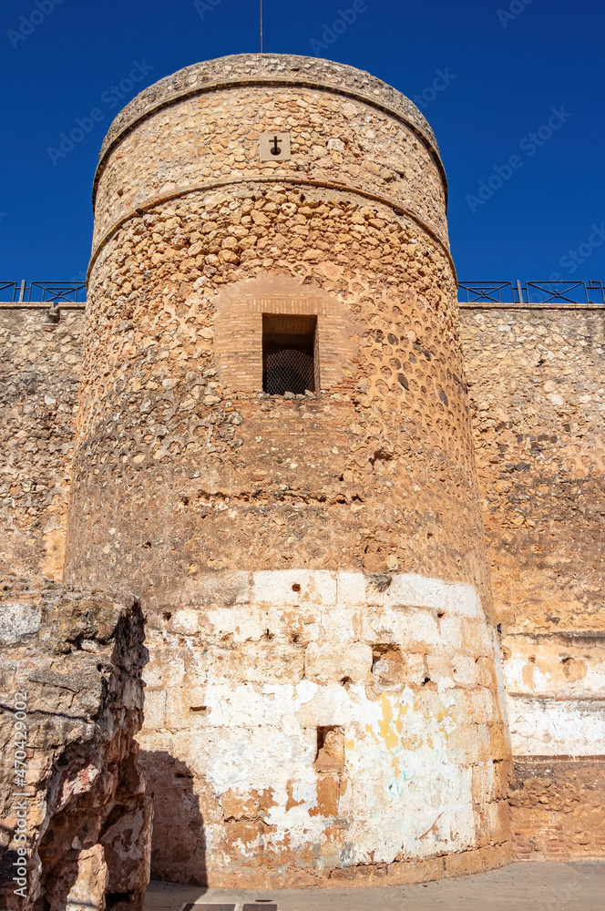 Round tower or turret in  defensive walls of Niebla castle, in Huelva, Andalucia, Spain