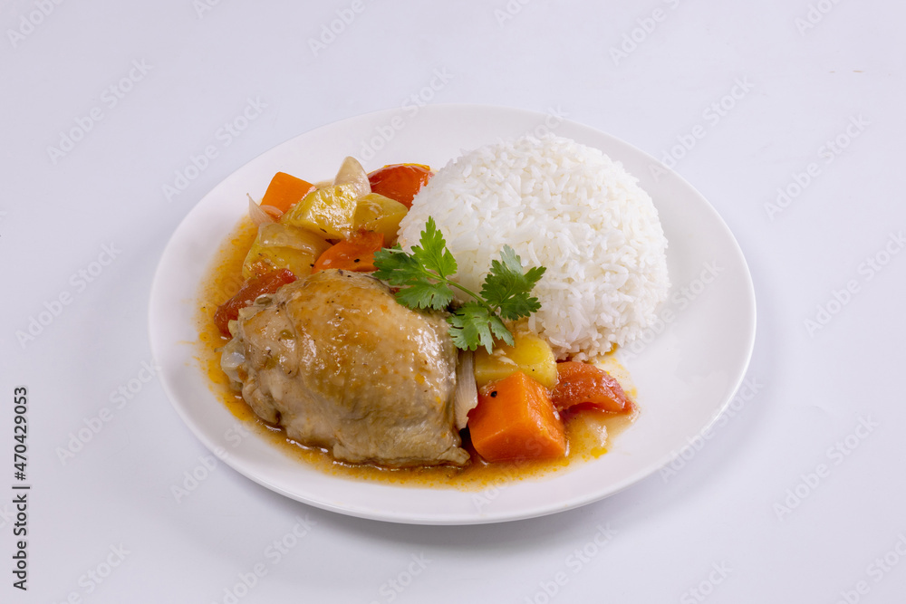 Rice and chicken stew with potatoes and carrots on white background Rice and chicken stew with potatoes and carrots on white background