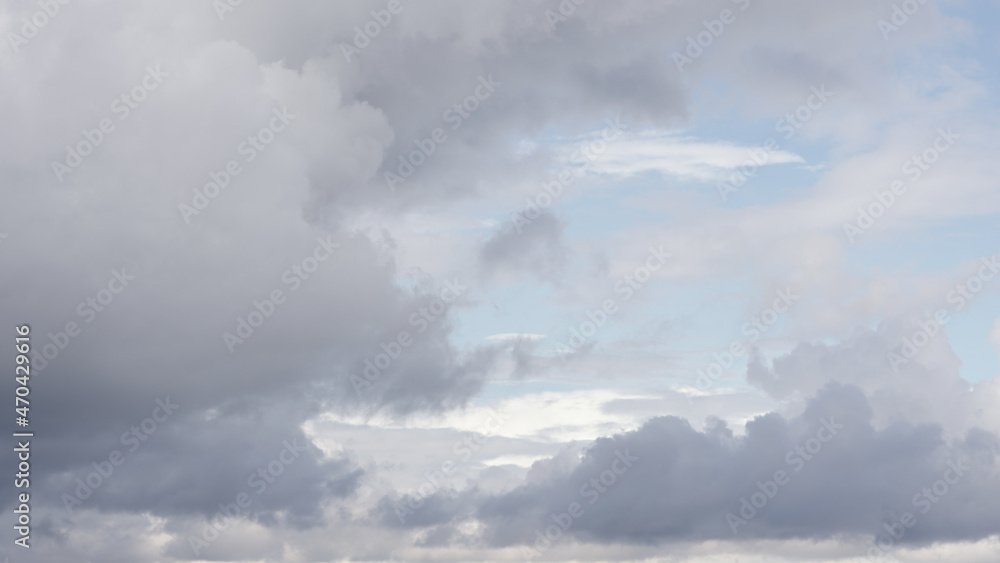 Storm rain clouds slowly drifting on sky