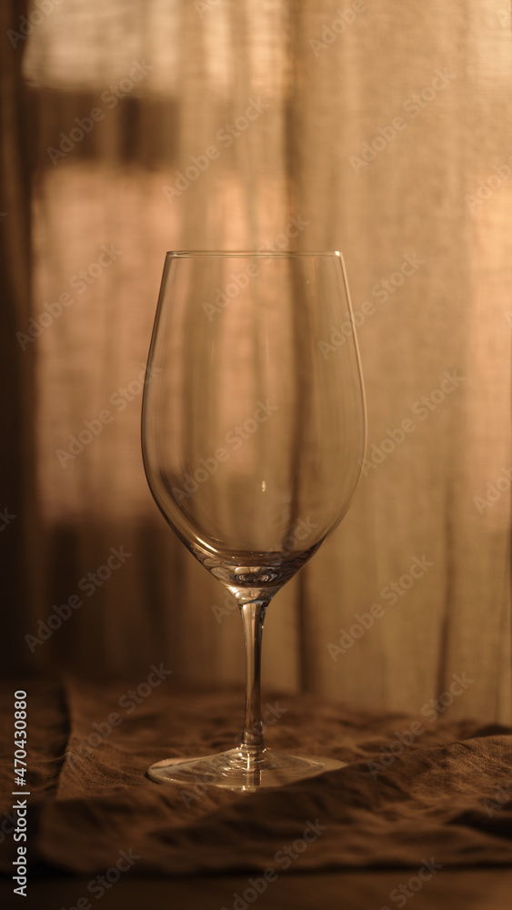 empty wineglass with sunset light empty wineglass with sunset light