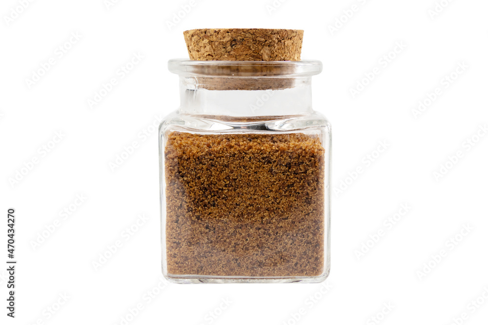 coconut sugar in a glass jar isolated on white background. Spice and food ingredients. coconut sugar in a glass jar isolated on white background. Spice and food ingredients.