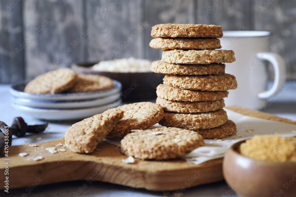 Crispy oatmeal cookies with unrefined brown sugar and cup of coffee Crispy oatmeal cookies with unrefined brown sugar and cup of coffee