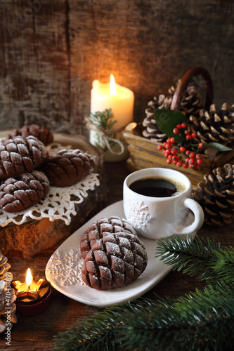 Christmas chocolate pine cone shortbread cookie and cup of coffee, New Year's decoration