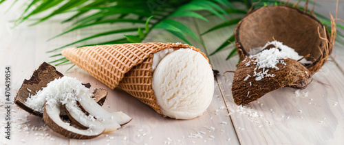 coconut ice cream on a white wooden background