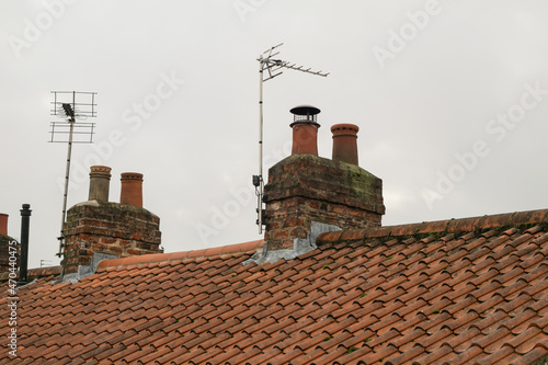 Wallpaper Mural Roof tiles and chimneys of British terraced houses in York England Torontodigital.ca