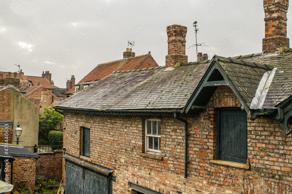Back view of an old abandoned traditional British brick house in York England Back view of an old abandoned traditional British brick house in York England