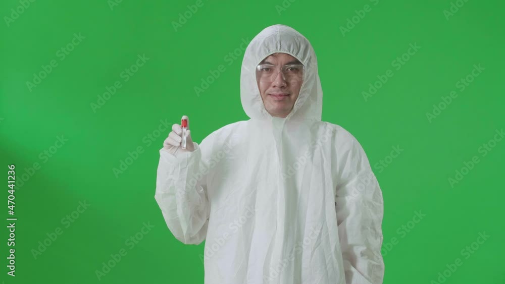 Asian Man Wearing Personal Protective Equipment Uniform Ppe And Holding A Glass Of Test Tube In The Green Screen Studio
Asian Man Wearing Personal Protective Equipment Uniform Ppe And Holding A Glass Of Test Tube In The Green Screen Studio