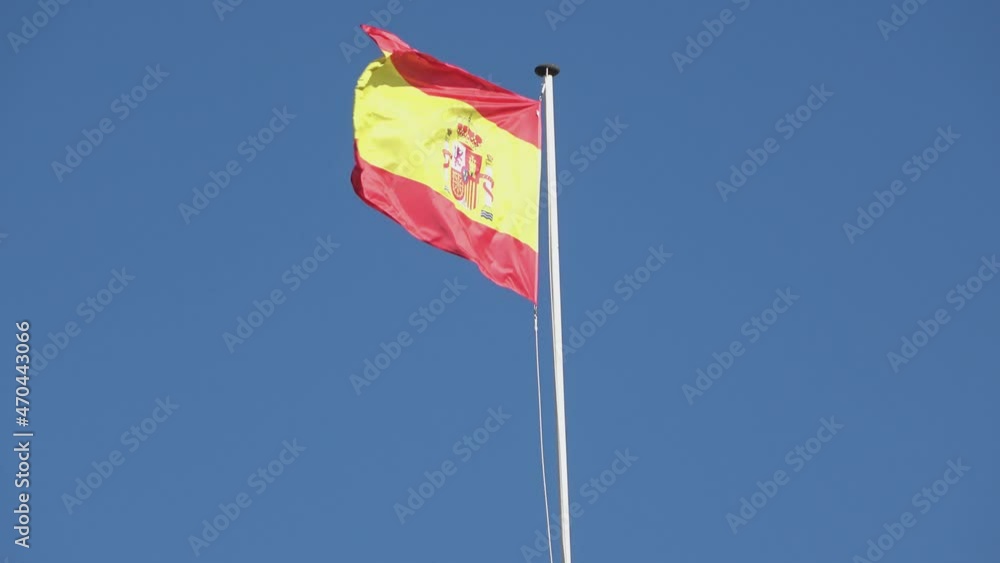 Flag of spain on the mast blowing in the wind Flag of spain on the mast blowing in the wind