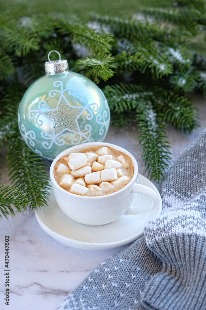 custom made wallpaper toronto digitalcoffee cup with marshmallows, sweater, Christmas ball, fir tree branches on marble background. Christmas and new year holidays concept. festive winter season.