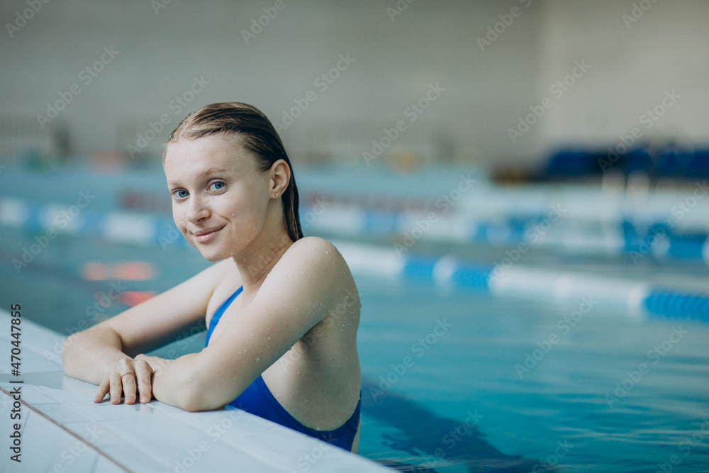 Woman professional swimmer in swimming pool