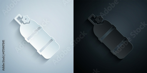 Paper cut Aqualung icon isolated on grey and black background. Oxygen tank for diver. Diving equipment. Extreme sport. Diving underwater equipment. Paper art style. Vector