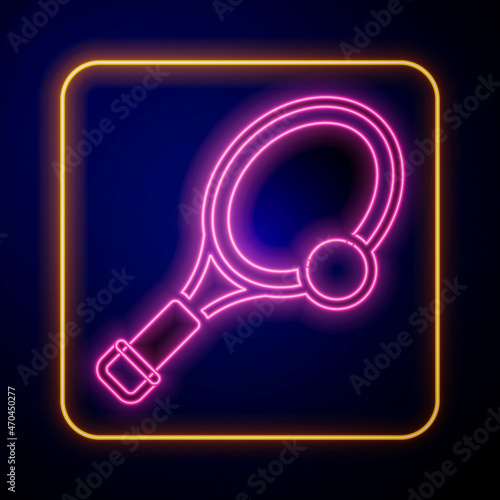 Glowing neon Tennis racket with ball icon isolated on black background. Sport equipment. Vector