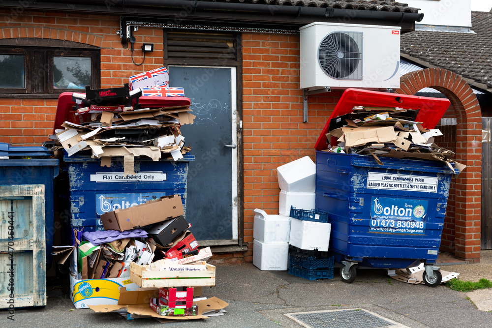 Woodbridge Suffolk UK July 07 2021 Overflowing commercial rubbish bins
