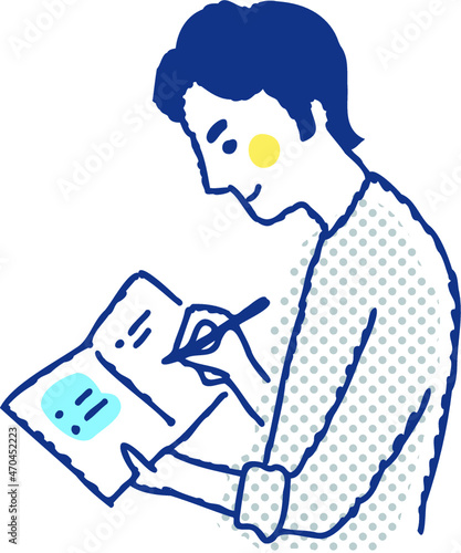 ノートにメモしている男性