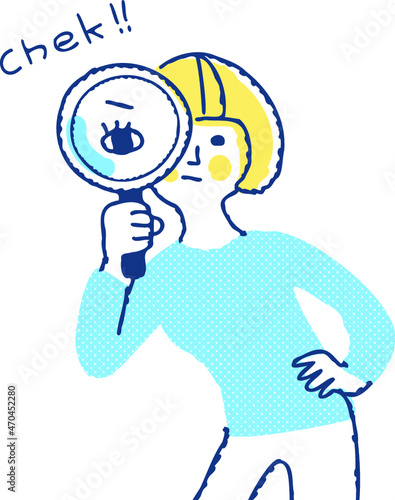 虫眼鏡を覗いている若い女性
