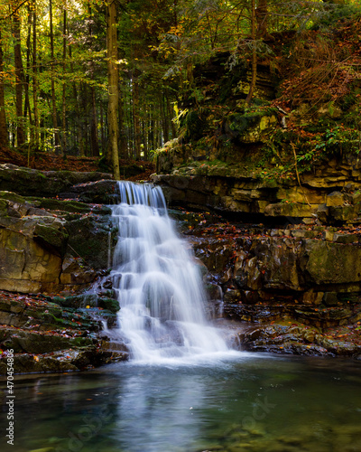 Beautiful waterfall among the canyon in the Carpathian mountains. Manyavsky waterfall.