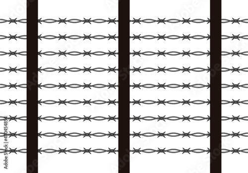 Alambrada de espino negro de una frontera.