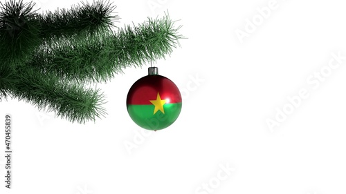 New Year's ball with the flag of Burkina Faso on a Christmas tree branch isolated on white background. Christmas and New Year concept.